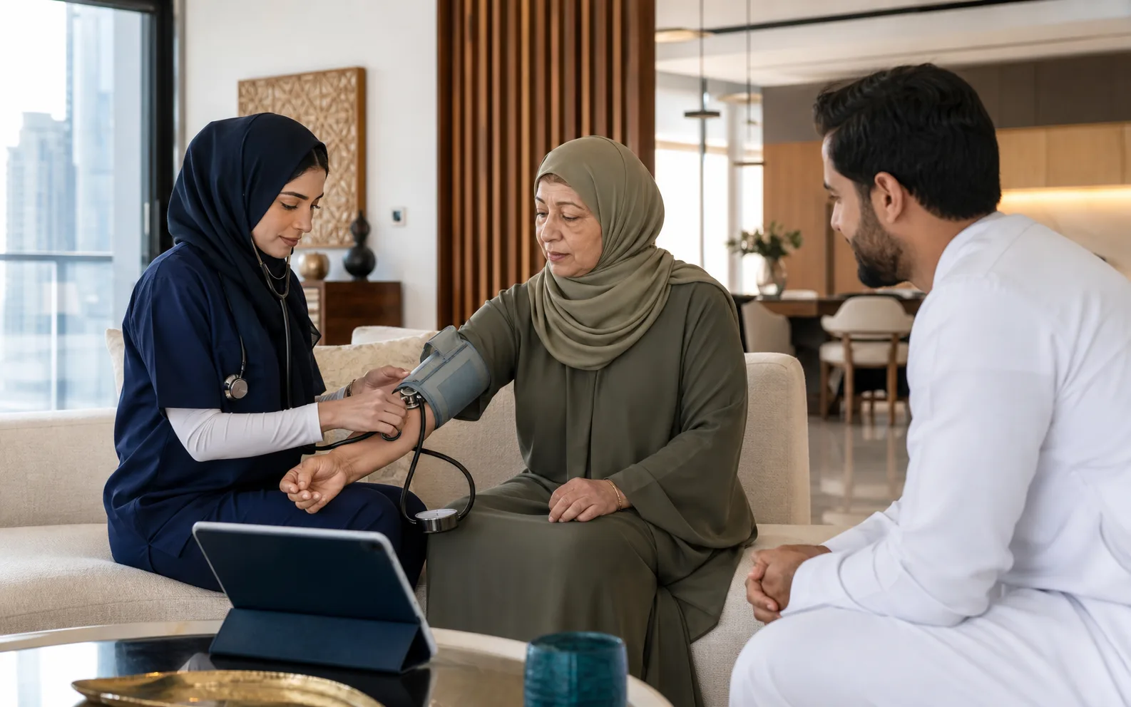 Home healthcare nurse supporting an older patient during a visit in the UAE